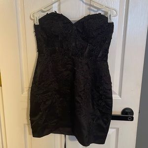 Black homecoming/cocktail dress; strapless; corset top; comes with padding